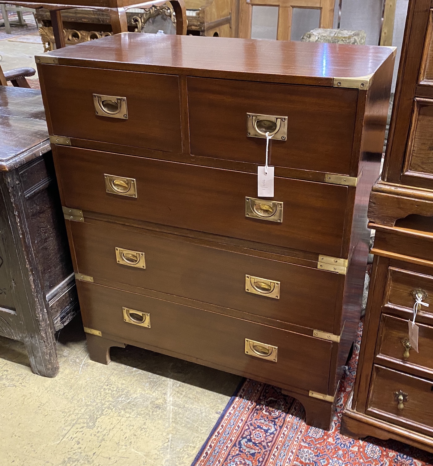 A reproduction brass mounted mahogany two part military style chest, width 78cm, depth 39cm, height 94cm